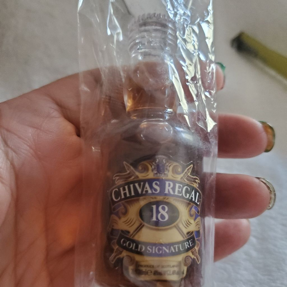 Open it up with this Chivas Regal 5 inch Brown Gold magnet Bottle opener